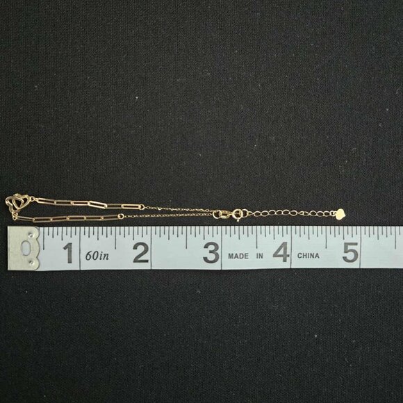 18k bracelet with little twinhearts pendant design - Picture 14 of 16